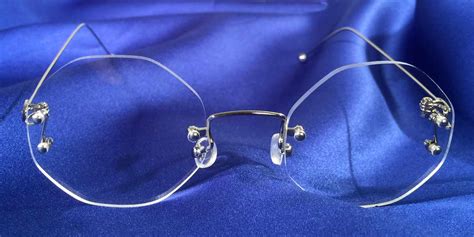 rimless octagonal eyeglass frames.